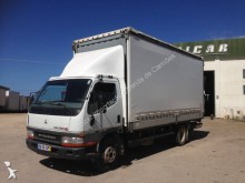 camion système bâchage coulissant Mitsubishi