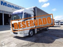 MAN tarp truck