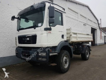 MAN three-way side tipper truck