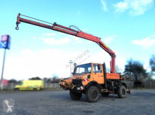 camion Mercedes Unimog U 1250 Pritsche Heckkran