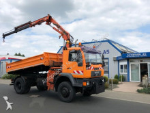 MAN three-way side tipper truck