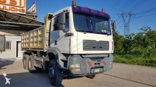 MAN three-way side tipper truck