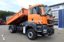 MAN three-way side tipper truck