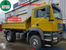 MAN three-way side tipper truck