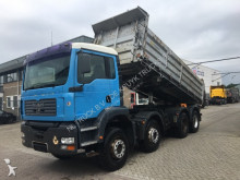 MAN three-way side tipper truck