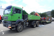 MAN three-way side tipper truck