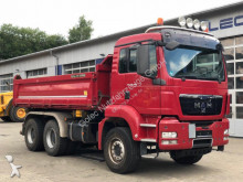 MAN three-way side tipper truck
