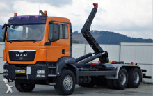 MAN skip truck