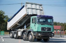 MAN three-way side tipper truck
