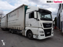 MAN tarp truck
