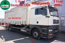 MAN tarp truck