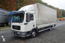 MAN tarp truck