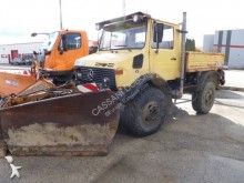 camión volquete trilateral Unimog