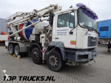 vrachtwagen MAN 32.414 Putzmeister TTM 21mtr + 7 M3 mixer