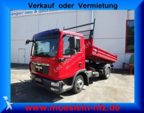 MAN three-way side tipper truck
