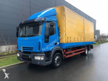 camião caixa aberta com lona Iveco