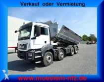 MAN three-way side tipper truck