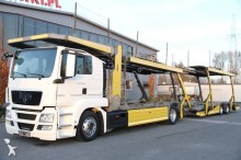 ciężarówka z przyczepą do transportu samochodów MAN