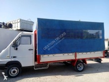 Renault tarp covered bed flatbed van