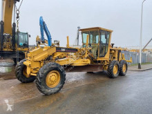 грейдер Caterpillar